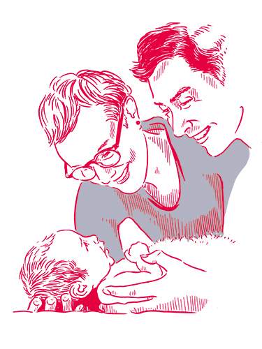 Parents bend over a baby that looks up at them Parents bend over a baby that looks up at them