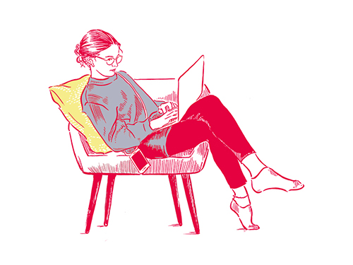 young woman with notebook on her lap and mobile phone at her side young woman with notebook on her lap and mobile phone at her side